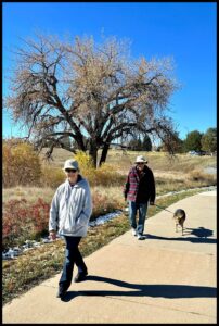 Ed and Perri walking with their dog_neighbors of The Big 65