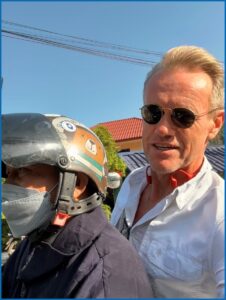 Karl riding with man on motorcycle_Karl Bruns-Kyler.