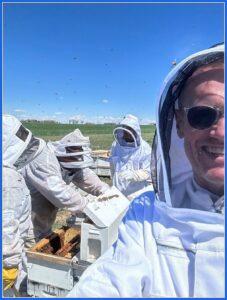 Karl Bruns-Kyler working with bees in Colorado_The Big 65.