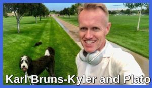 Nevada Medicare insurance broker Karl Bruns-Kyler and his black and white dog Plato.