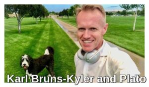 Washington state Medicare insurance broker Karl Bruns-Kyler and his faithful dog Plato on a field of green grass.