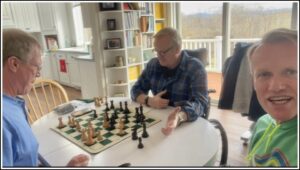 Karl and bros playing chess.