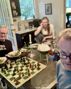 Karl and loved ones playing chess in the family kitchen in Virginia.