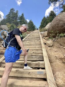 Patrick climbing the incline steps at Manitou Springs in Colorado.