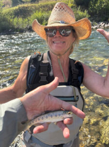 A small fish in a human hand.