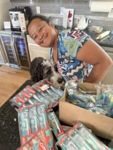 Hanta and Plato surrounded by toothbrushes.