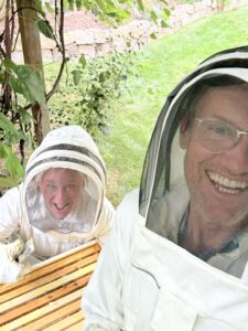 Karl working with the bee hives.