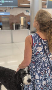 Quantz and Plato standing in the airport.