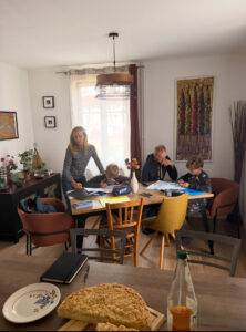 The family sitting at a table.