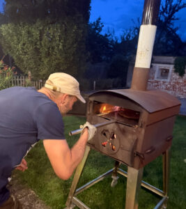 A man poking a fire.