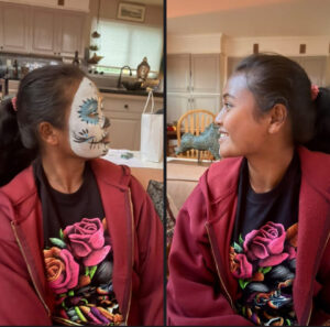 Miti with her face painted.