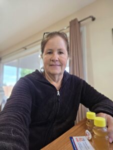 A satisfied client of The Big 65 with her honey.