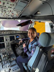 Miti in the front of the airplane cockpit.