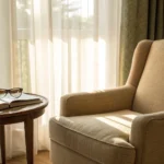 A comfortable armchair with a book and glasses, set up for researching and choosing between Medigap plans.