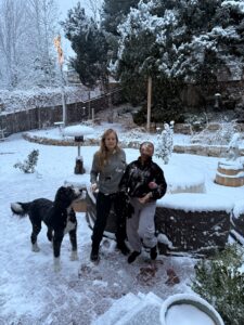 Quantz, Miti, and Plato in the backyard, surrounded by snow.