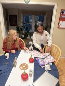 Quantz and Miti sitting at the kitchen table.