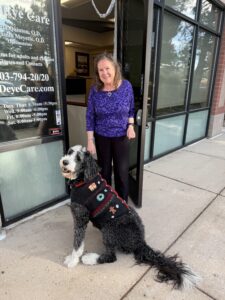 Karl standing with hew new friend.