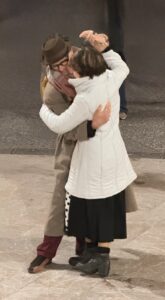 A man and woman dancing together.