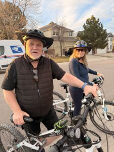 Joseph and his sister on bikes.