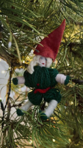 A Christmas ornament on a Christmas tree.