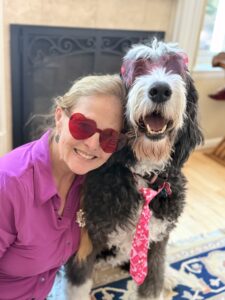 Quantz and Plato wearing pink Valentine's Day glasses.