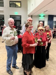 A group of men and women at a Valentine's Day dance in Highlands Ranch, Colorado.