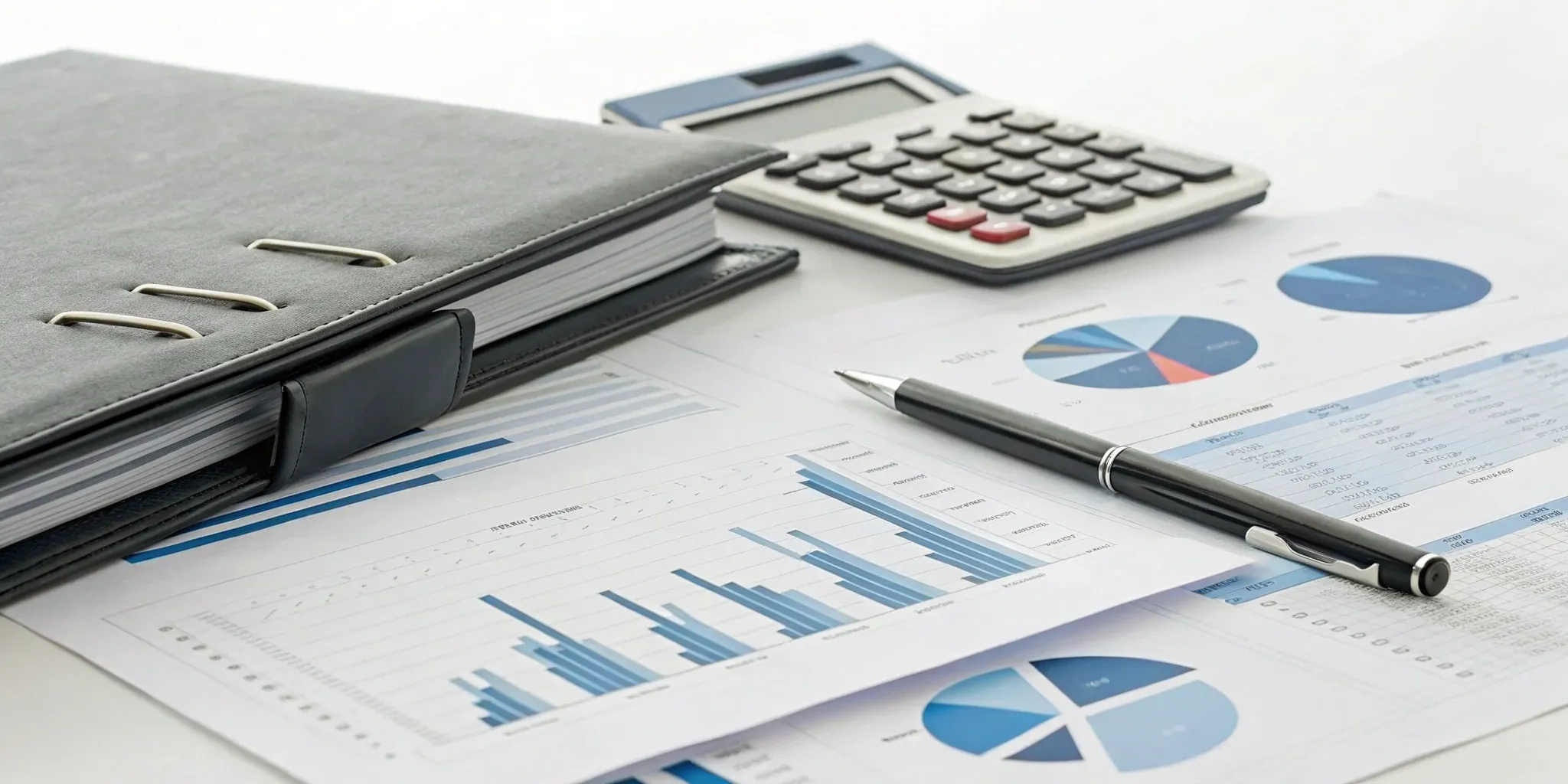 A calculator and financial charts breaking down the cost of different Medigap plans.