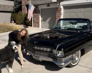 Quantz looking at classic car with Plato.