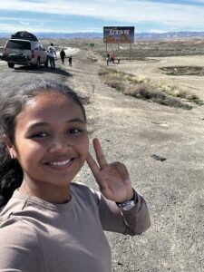 Miti giving the peace sign.