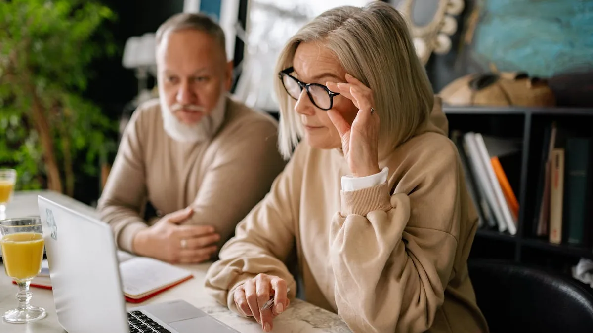 Senior couple reviewing Medicare supplement insurance options at a table