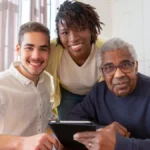 Senior couple consulting with a Medicare insurance advisor comparing Medicare Advantage and Medigap plan options