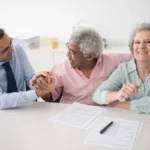 Senior couple meeting with a Medicare advisor to discuss Medicare Advantage plan options for 2026
