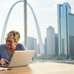 Senior couple in Missouri comparing Medigap plans on a laptop.