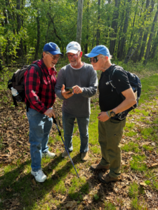 Three men in the mountains of Virginia.