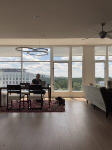 Karl sitting at a desk in Charlottesville, Virginia working on Medicare insurance.