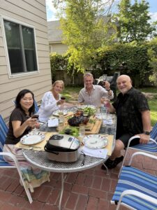 Four people celebrating The Big 65 Medicare Insurance Services.