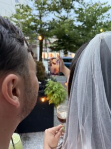 Two people looking at a phone.